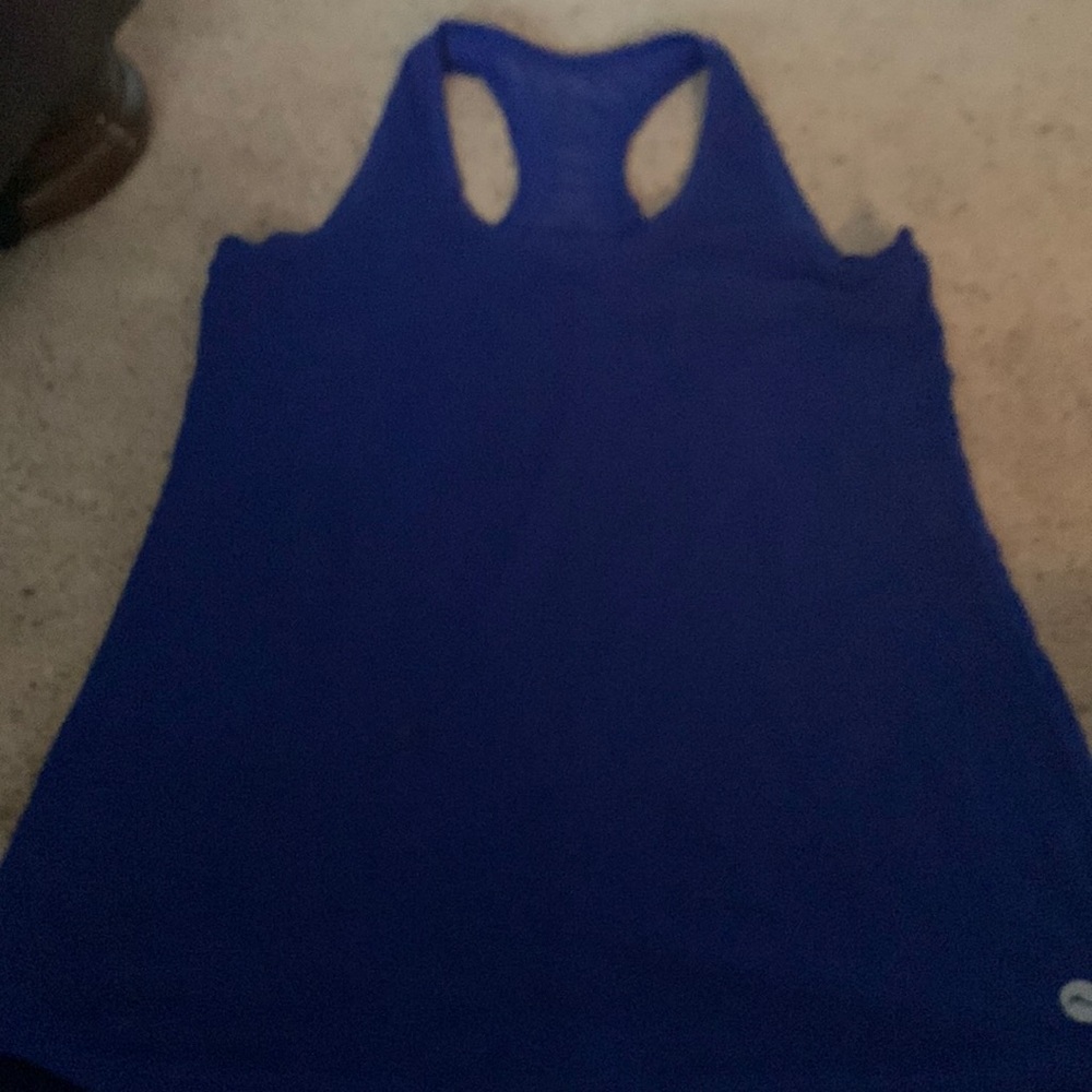 Fitted racer, back tank top, royal blue size medium.